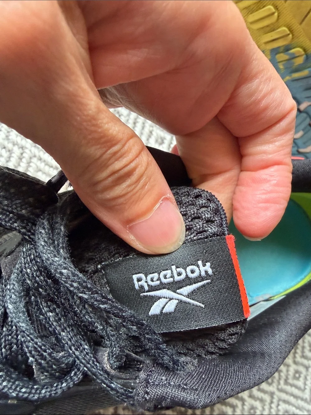 Reebok Nano X1 Black Running Shoes with Yellow, Red and Blue Accents